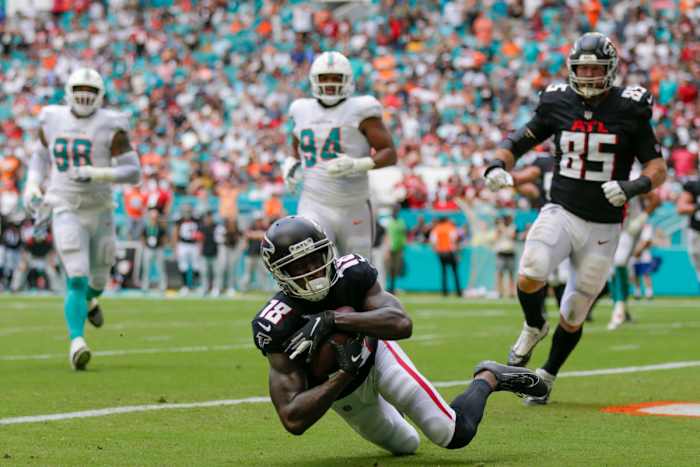 Oct 24, 2021; Miami Gardens, Florida, USA; Atlanta Falcons wide receiver Calvin Ridley (18) makes a catch in the end zone for a touchdown against the Miami Dolphins during the second quarter of the game at Hard Rock Stadium. Mandatory Credit: Sam Navarro-USA TODAY Sports